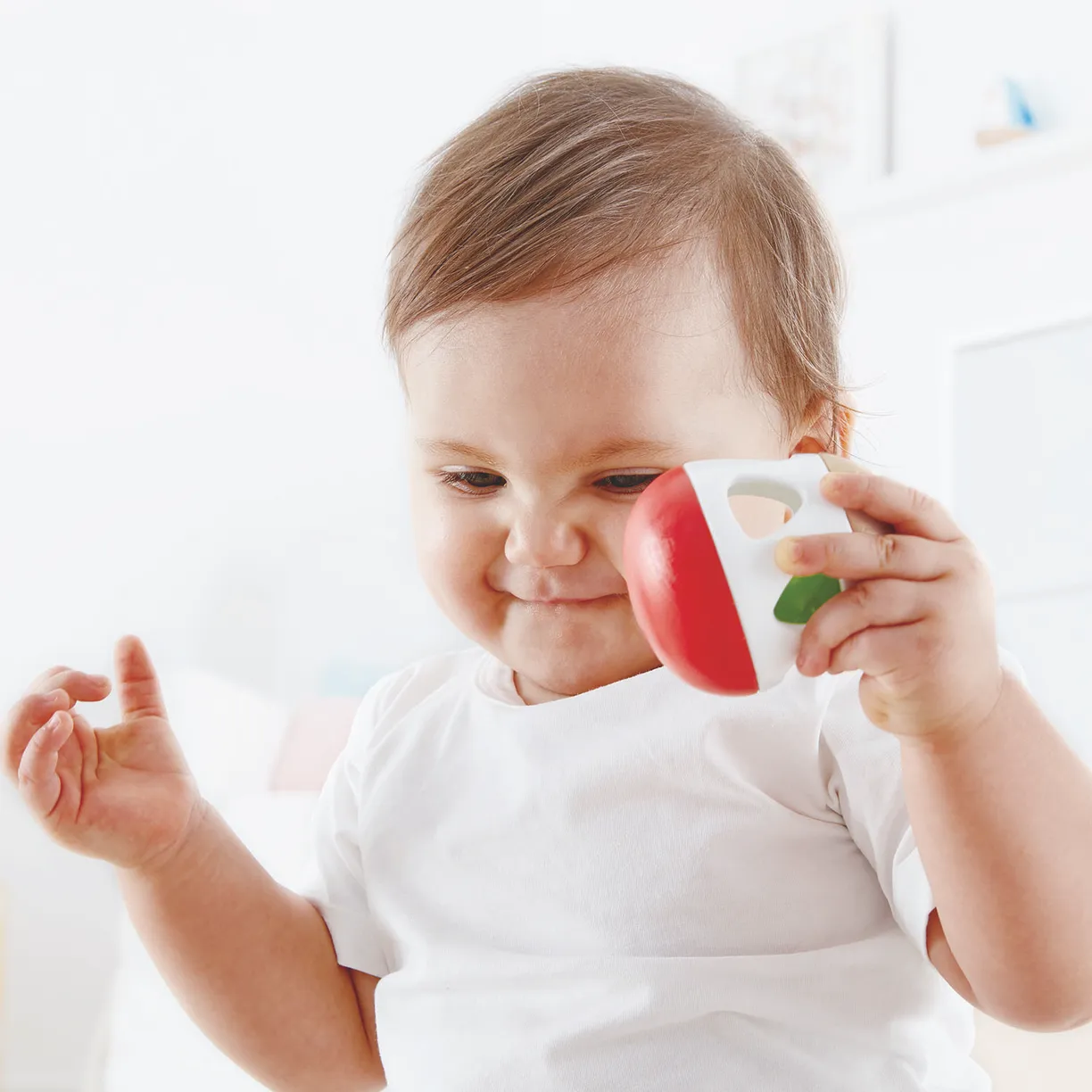 Игрушка Hape 3-в-1 погремушка-неваляшка-бумеранг "Звон колокольчика" 4